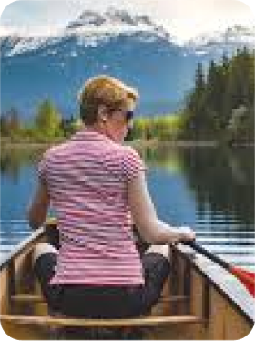 Dark wood console table with tall blue vases (1)